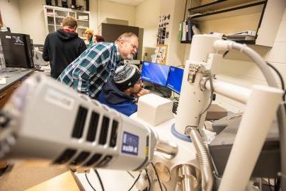 Student with microscope