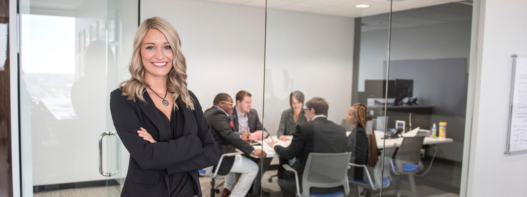 Female business student posing indoors.